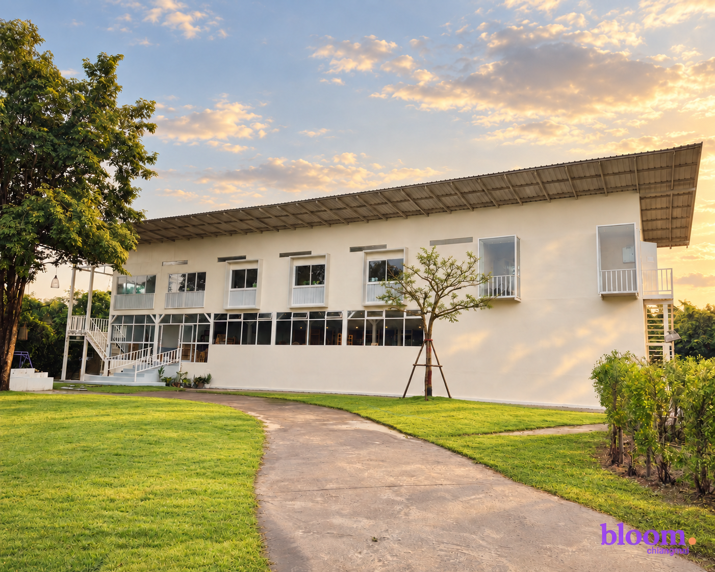 Bloom Chiangmai building exterior at sunset